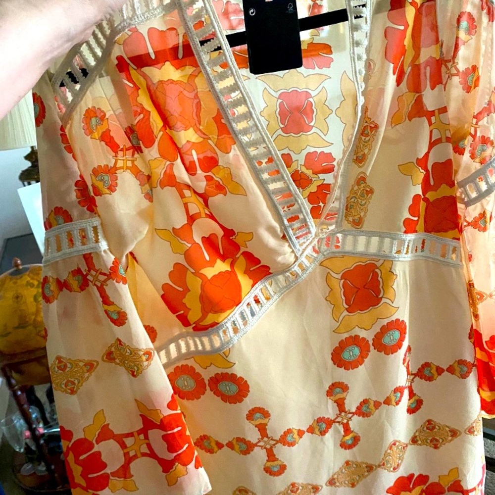Beautiful shirt or dress you decide.